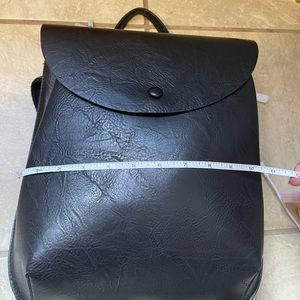 Calin collection Black Vegan Leather convertible backpack.